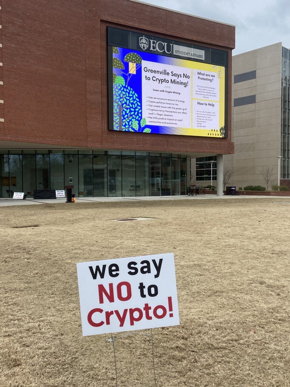 sign at ECU states "We say No to Crypto"