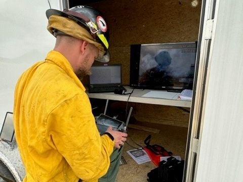 Volunteer working with a device