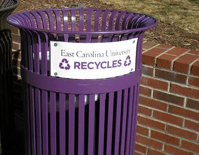 A purple outdoor recycling bin with "East Carolina University Recycles" on the side