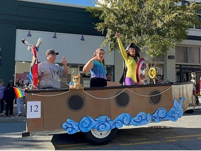 Students in a parade float