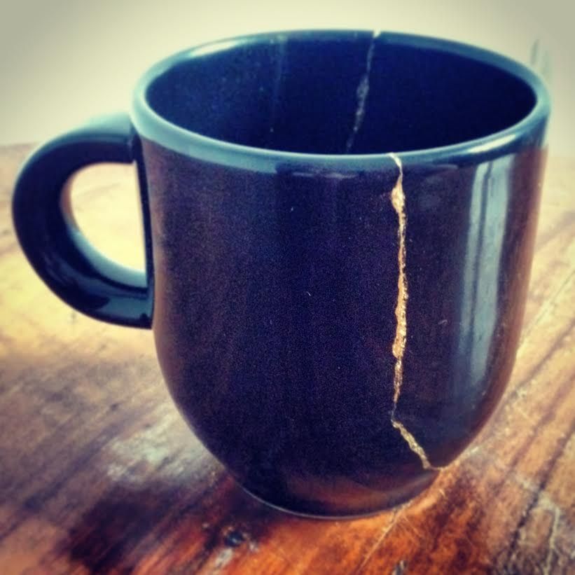 a mug with an old crack, repaired with glue