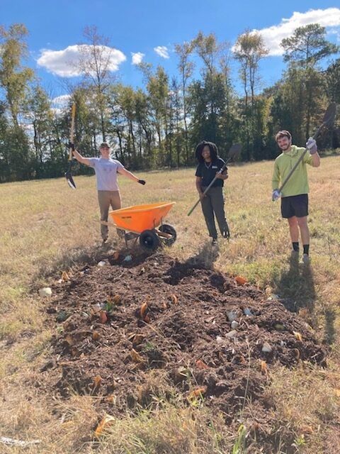 Students working in garden